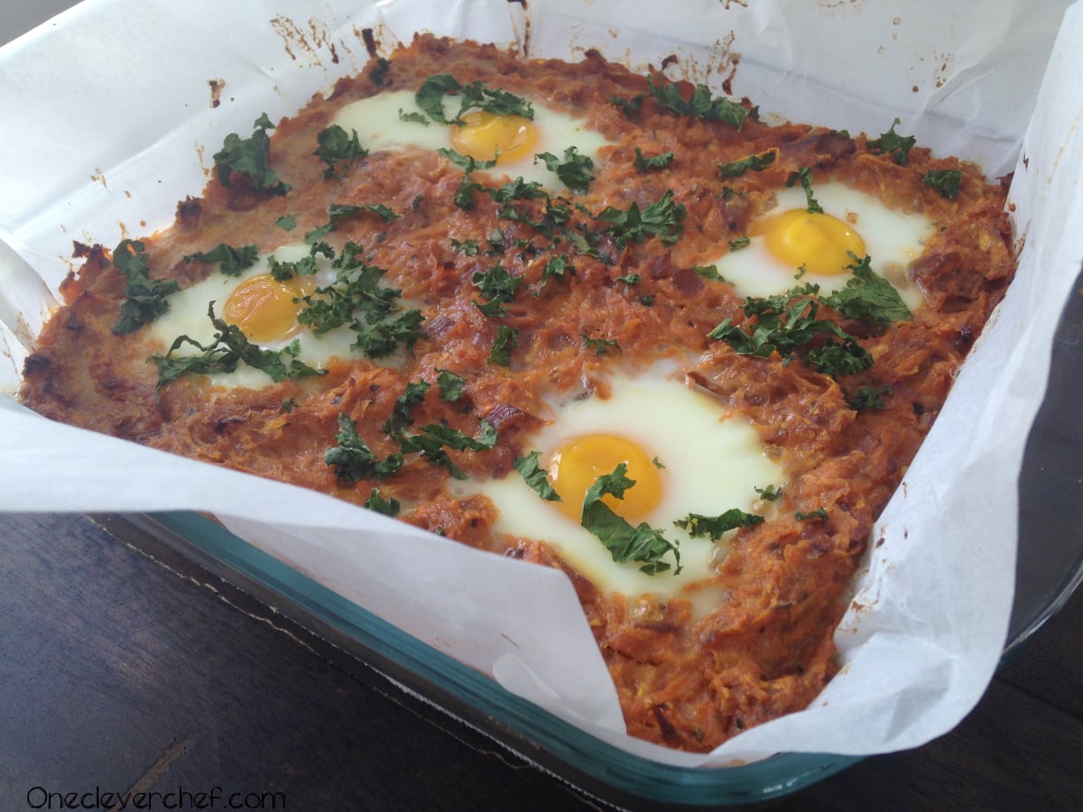 Sweet Potato And Caramelized Onion Hash | www.onecleverchef.com | eggs, sweet potato, turnip, greek yogurt, garlic, smoked paprika, parmesan cheese, kale