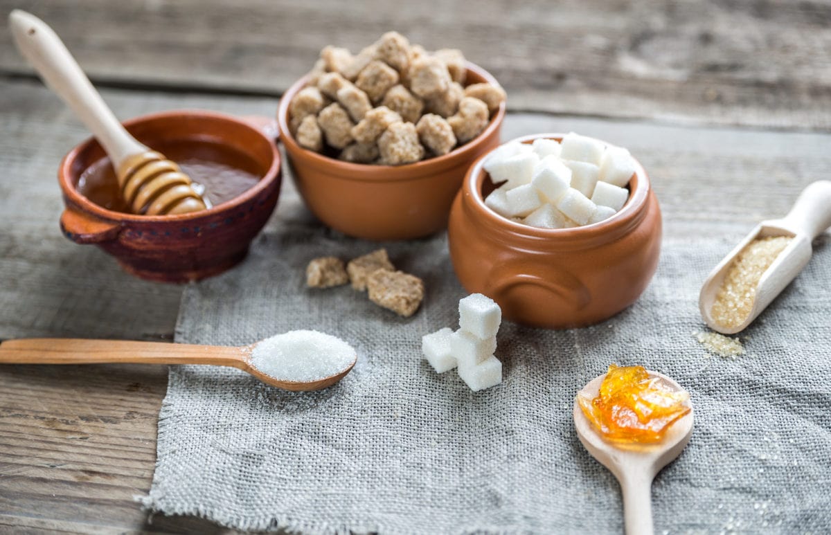 Different Types And Forms Of Sugar On The Wooden Background