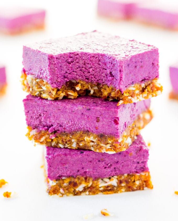 These Raw Vegan BlackBerry Cheesecake bars are super creamy and perfectly sweet. This easy no-bake dessert is also extremely healthy! You would never believe it's dessert by simply looking at the nutritional values. This recipe is also Paleo, Gluten-free, Egg-free, Flourless and Dairy-Free! | www.onecleverchef.com