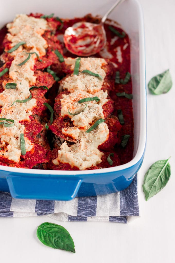 Seriously, where's the egg? This Vegan Fried Eggplant Casserole (AKA eggplant parmesan) is nothing like you've seen before. Making this dish Gluten-free, Egg-Free, Dairy-Free, Vegan, Flourless and Paleo was truly a feat... But I made it! In the traditional recipe, the eggplant is usually coated with egg then panko or Italian breadcrumbs. Not here. This recipe is 100% healthy, made with real unprocessed food and so, so good...! | www.onecleverchef.com