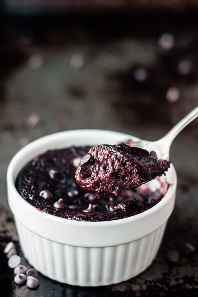 You can have this healthy, delicious and fudgy 3 ingredient chocolate protein mug cake ready within the next 2 minutes. Wait! What?! That's right. This easy, one bowl (or mug) chocolate protein cake is super easy to make. All you need to make this decadent, moist, gooey and protein-packed treat is a fork, a bowl, and a microwave! For a molten lava chocolate cake version, simply reduce the baking time slightly. Entirely Paleo, vegan, gluten-free, dairy-free, nut-free, egg-free,  flourless and kid-friendly! Chocolate cake for breakfast? Yes, YES! (Oven option available) | www.onecleverchef.com