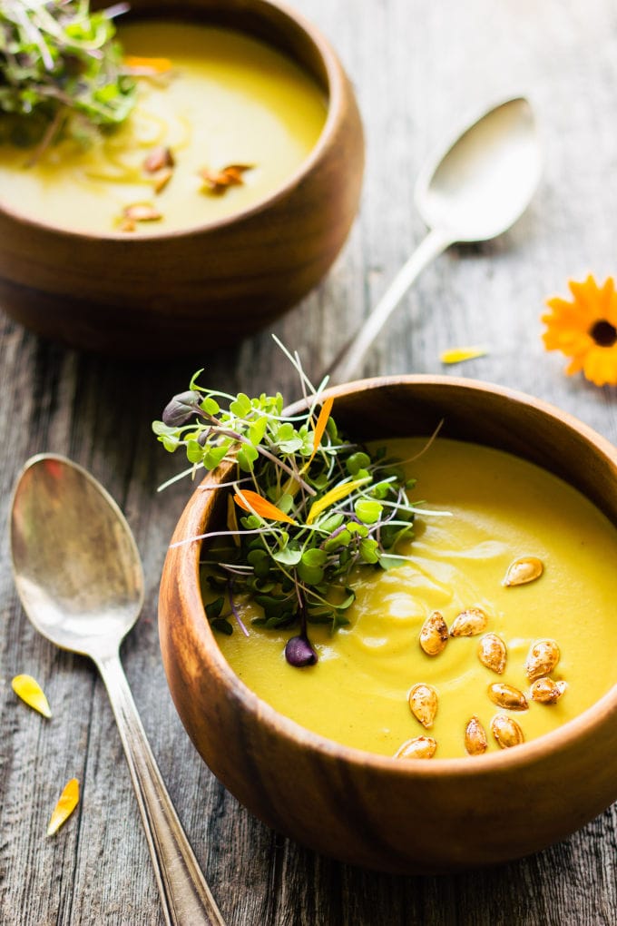 This easy and healthy curried acorn squash soup is the perfect fall comfort food. Sweet and spicy, creamy and savory, this simple potage is also vegan, gluten-free, dairy-free, paleo, vegetarian, flourless, nut-free and sugar-free. | www.onecleverchef.com