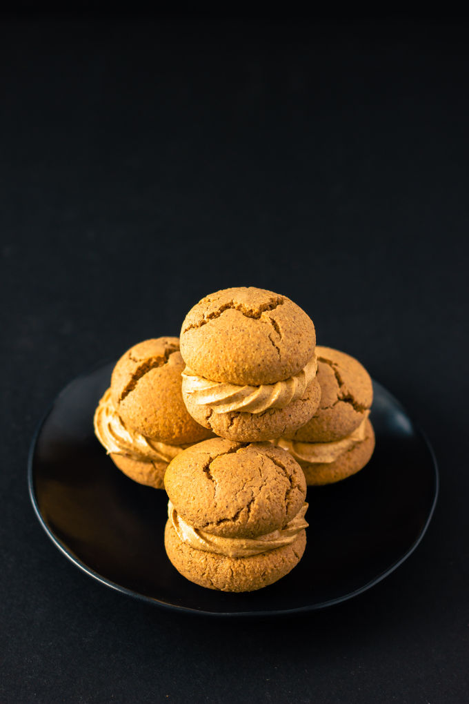 Apple Pie Flavored Vegan Protein Cookies with a salted caramel filling! Healthy, simple and naturally sweetened. Vegan, gluten-free, dairy-free and egg-free recipe. | onecleverchef.com