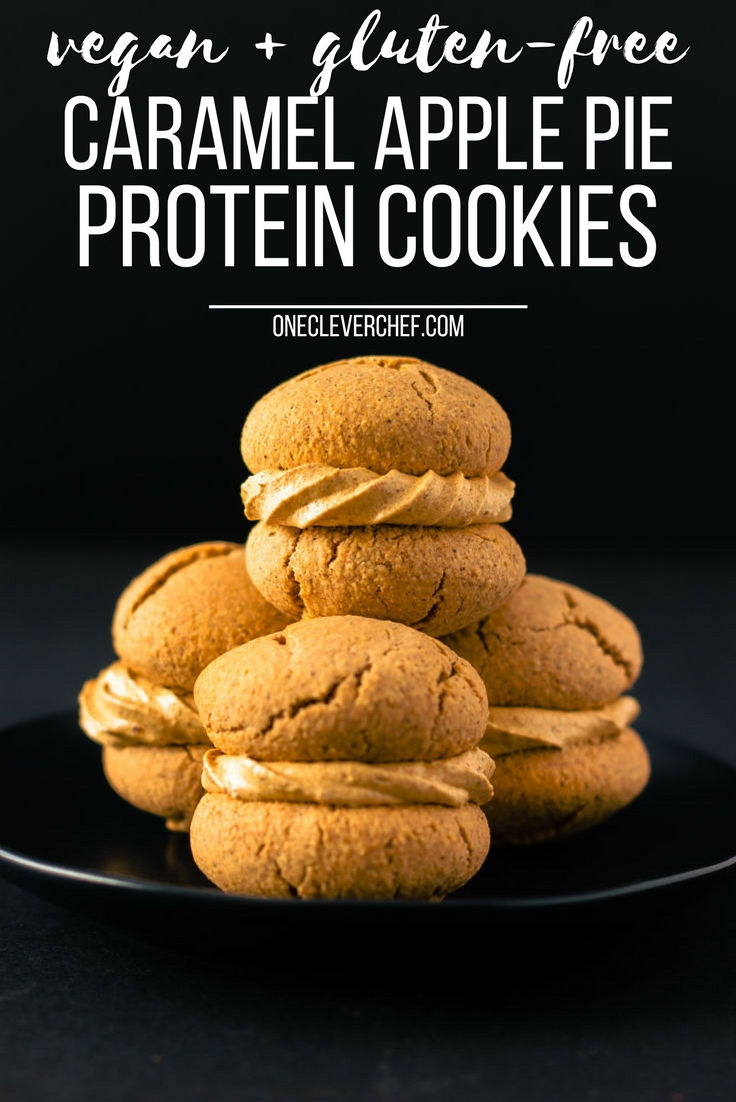 Apple Pie Flavored Vegan Protein Cookies with a salted caramel filling! Healthy, simple and naturally sweetened. Vegan, gluten-free, dairy-free and egg-free recipe. | onecleverchef.com