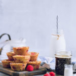 Lemon raspberry muffins on a cutting board