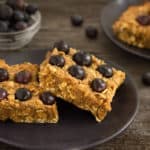 These homemade blueberry protein bars are soft, chewy and moist. Ready in about 20 minutes, these delicious healthy bars are easy to prepare and only require one bowl and your hands to whip up. Perfect either as a post-workout snack or simply as a dessert, they are naturally sweetened, gluten-free, vegan and flourless!