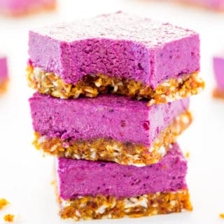 These Raw Vegan BlackBerry Cheesecake bars are super creamy and perfectly sweet. This easy no-bake dessert is also extremely healthy! You would never believe it's dessert by simply looking at the nutritional values. This recipe is also Paleo, Gluten-free, Egg-free, Flourless and Dairy-Free! | www.onecleverchef.com