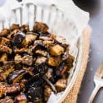 These oven roasted eggplant cubes are a delicious, much healthier alternative to potato fries. The recipe for the balsamic vinaigrette is of Mediterranean inspiration with strong Greek flavors. While being 100% healthy, this recipe is also entirely paleo, gluten-free, vegan, low-carb, dairy-free, flourless, nut-free and egg-free. | www.onecleverchef.com