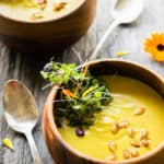 This easy and healthy curried acorn squash soup is the perfect fall comfort food. Sweet and spicy, creamy and savory, this simple potage is also vegan, gluten-free, dairy-free, paleo, vegetarian, flourless, nut-free and sugar-free. | www.onecleverchef.com