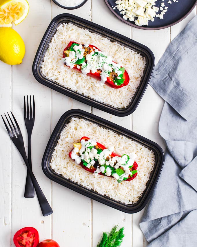 Turkey quinoa stuffed peppers on a bed of rice.