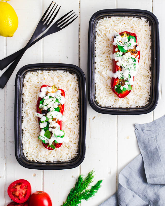 Turkey quinoa stuffed peppers on a bed of rice.