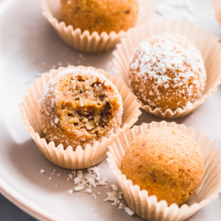 Lemon coconut protein balls on a plate