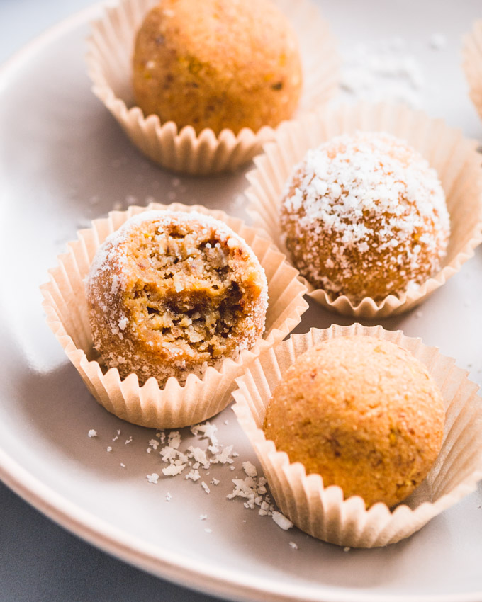 Lemon coconut protein balls on a plate