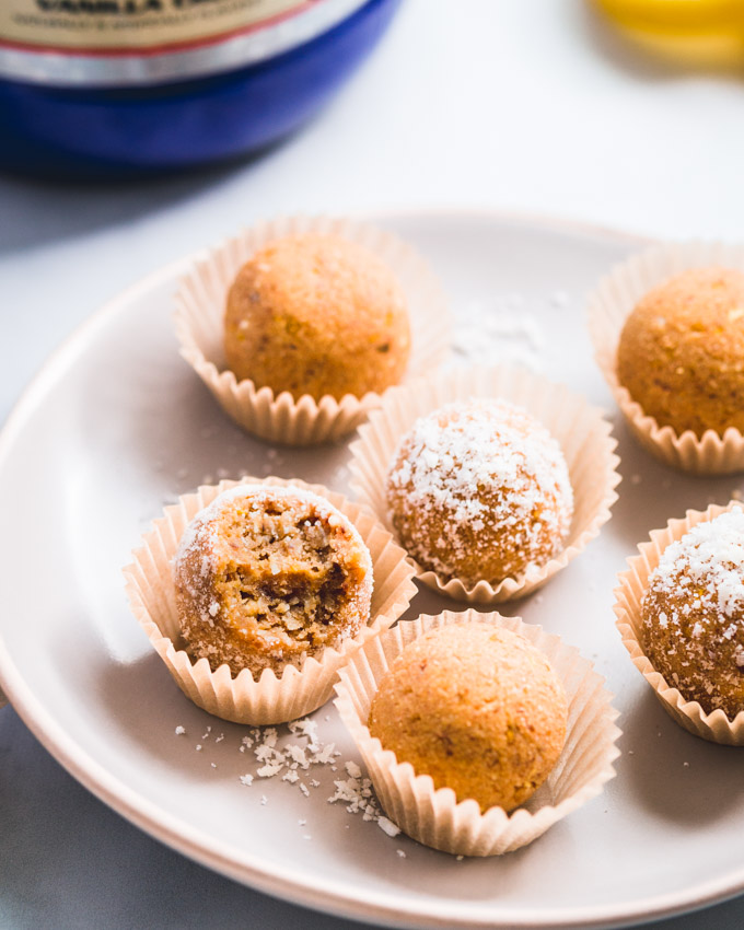 Lemon coconut protein balls on a plate