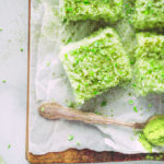 Keto Matcha Lime Fat Bombs on a wooden cutting board