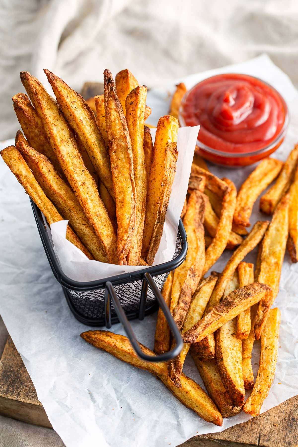 Air Fryer Steak Fries in a metal basket