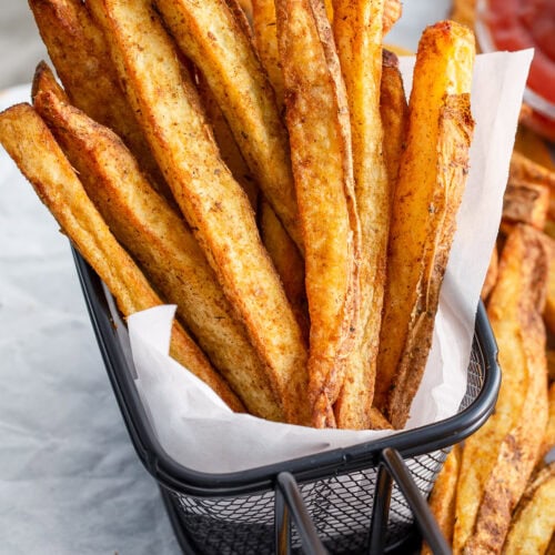 Air Fryer Steak Fries in a metal basket