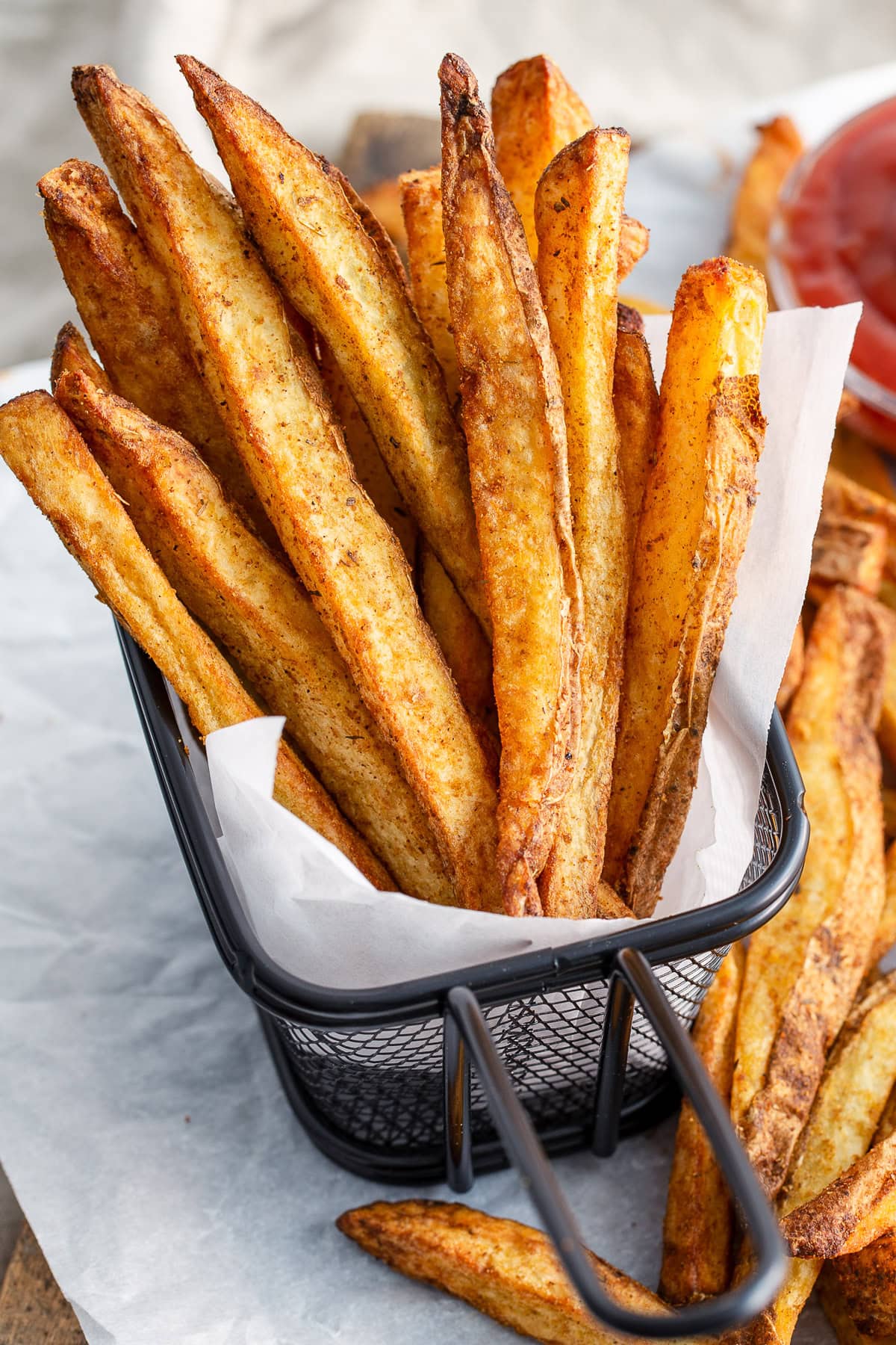 Air Fryer Steak Fries in a metal basket